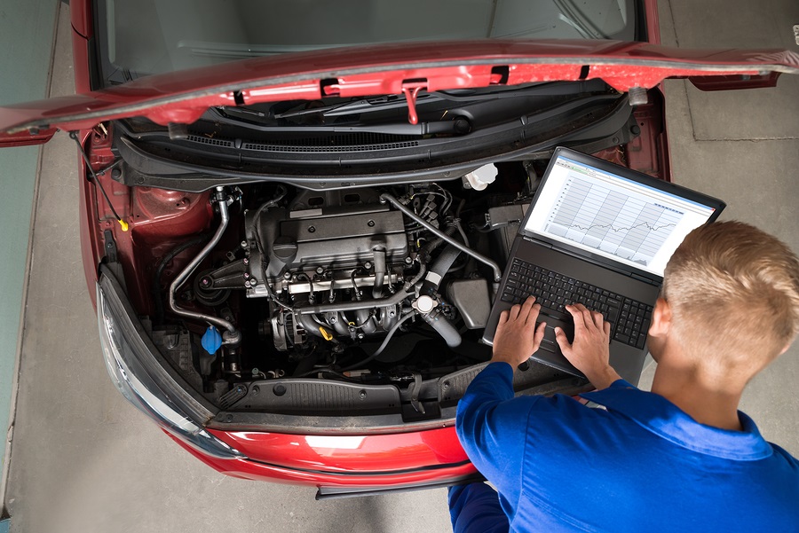 Auto repair shop diagnosing check engine light issues